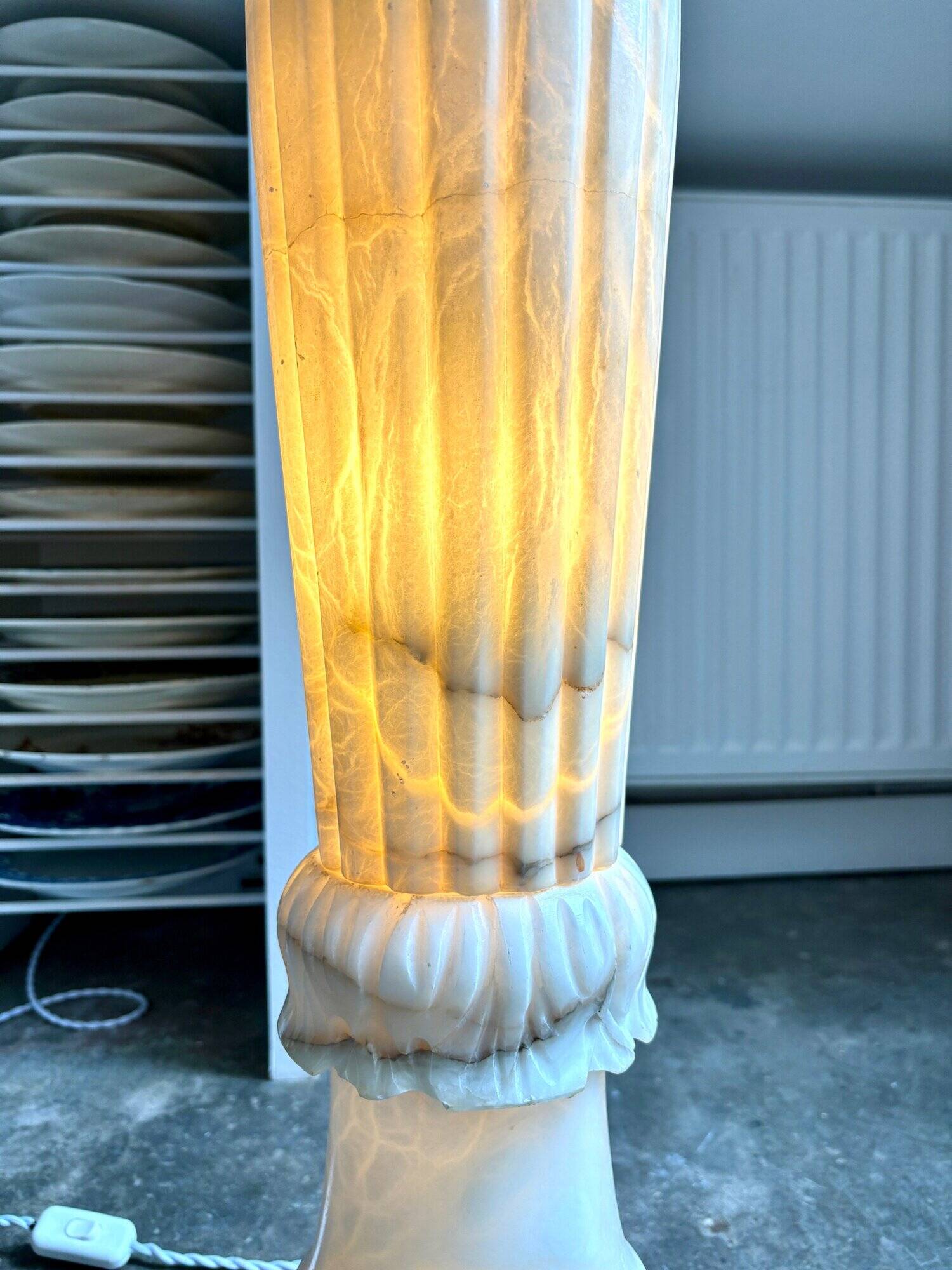 Column, illuminated alabaster saddle