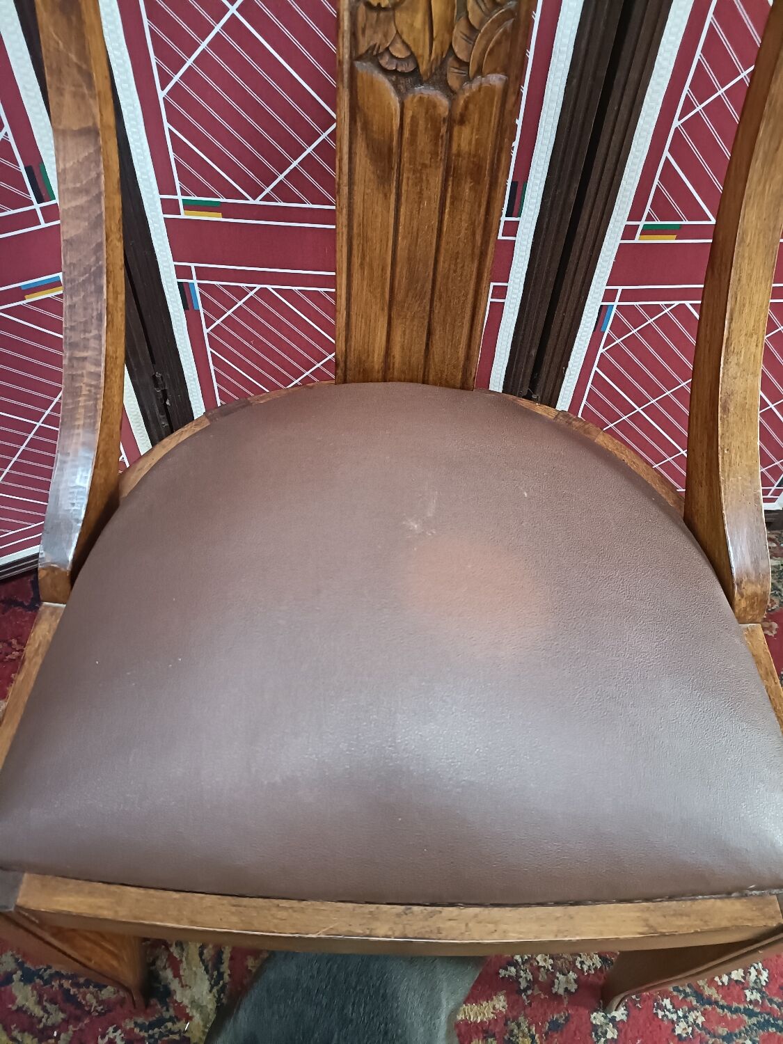 Gondola chair with art-deco motifs, spring leatherette seat