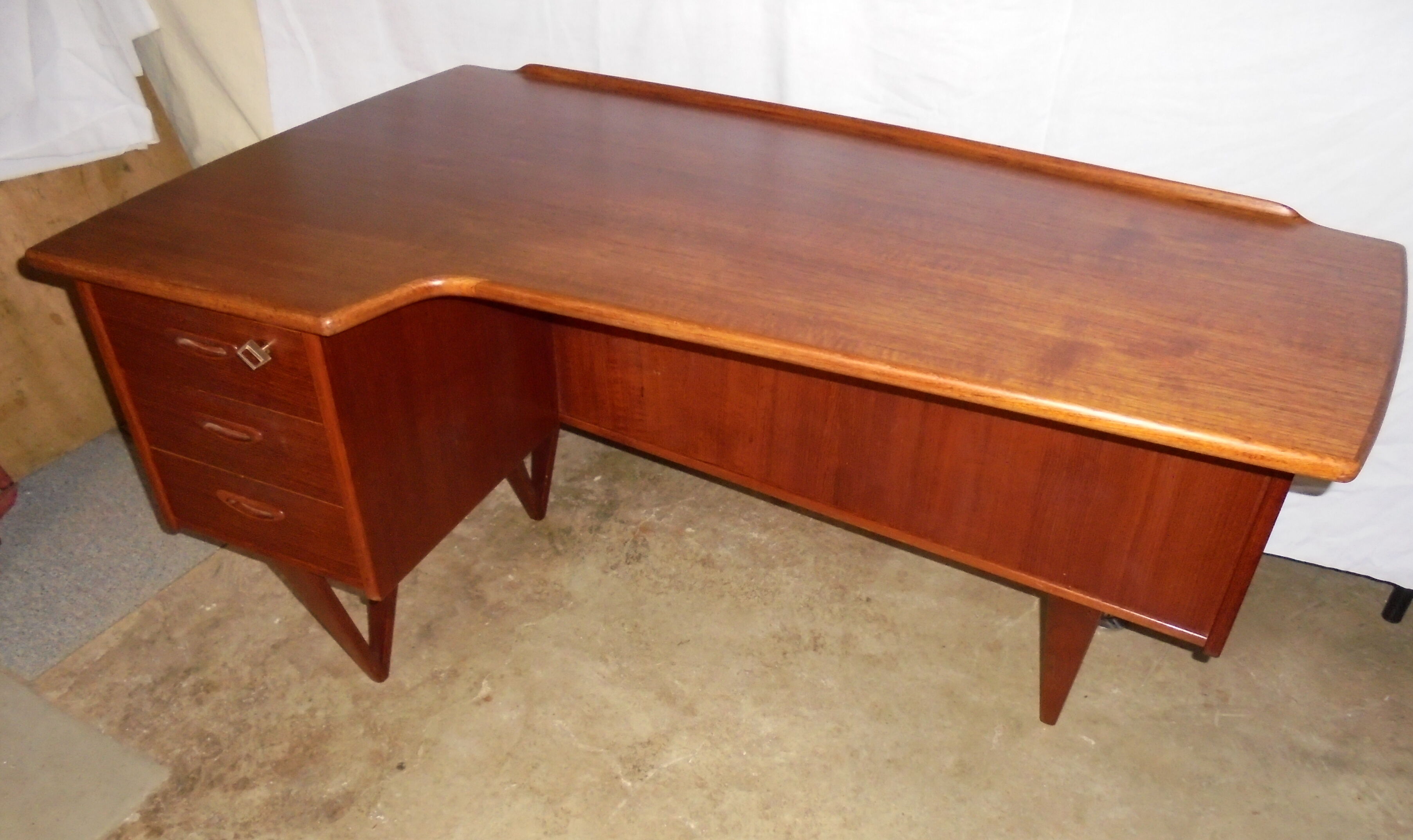 Peter Lovig Nielsen's Scandinavian teak boomerang desk from the 60s
