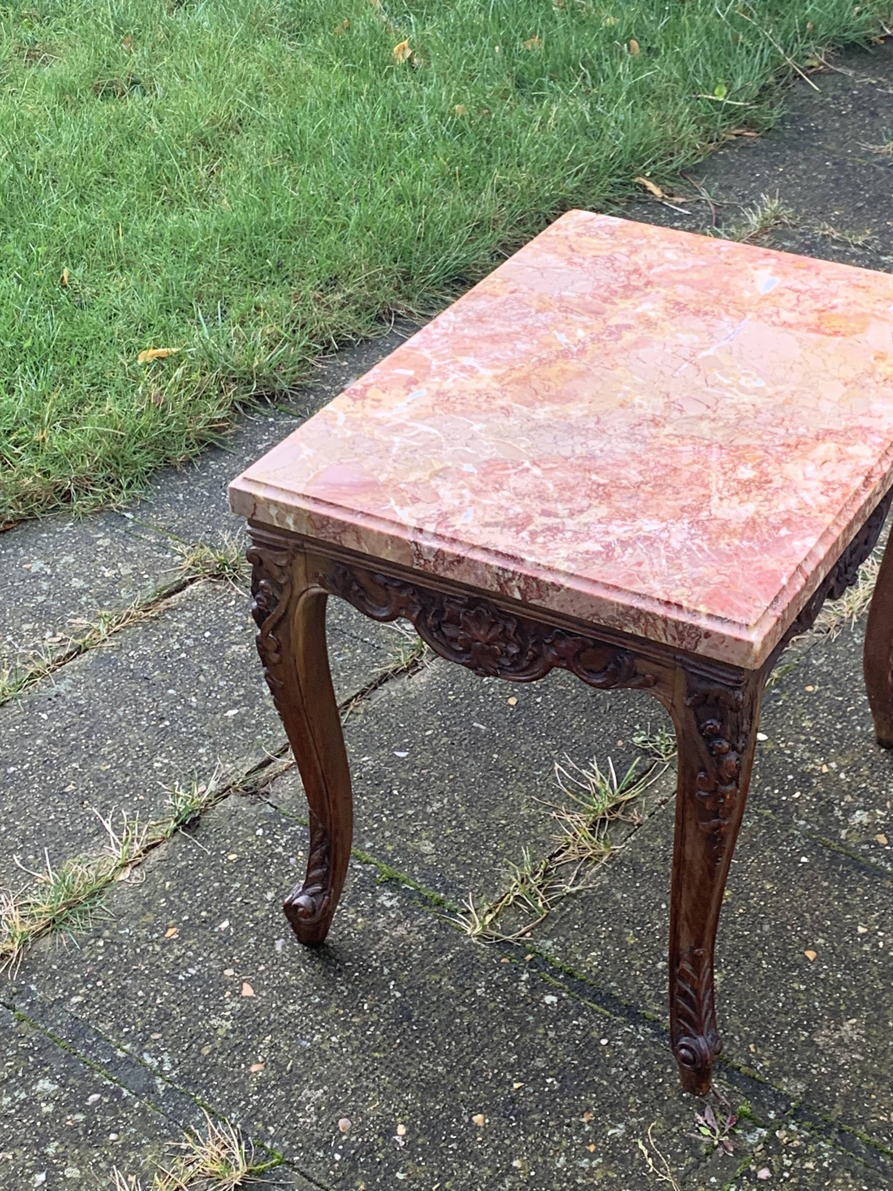 Carved wooden coffee table with shell pattern and removable pink marble top, old