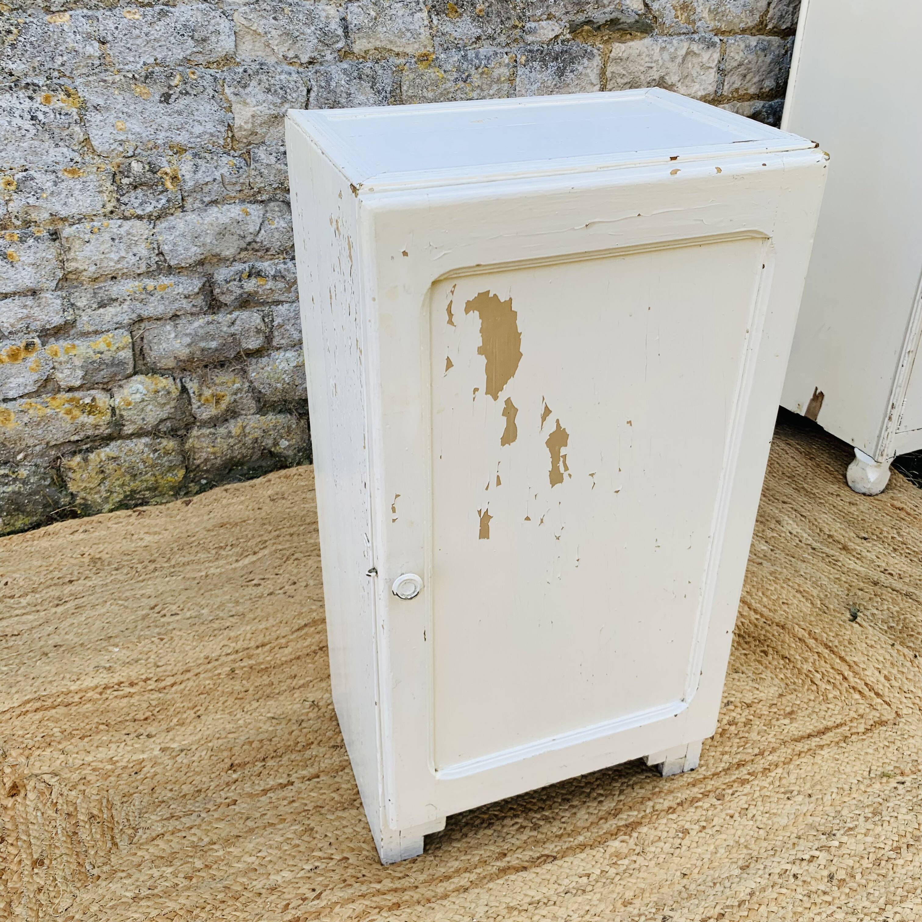 Small white Parisian piece of furniture