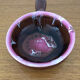 Brown and pink glazed terracotta caquelon