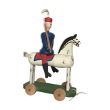 Soldier on wooden horse to shoot