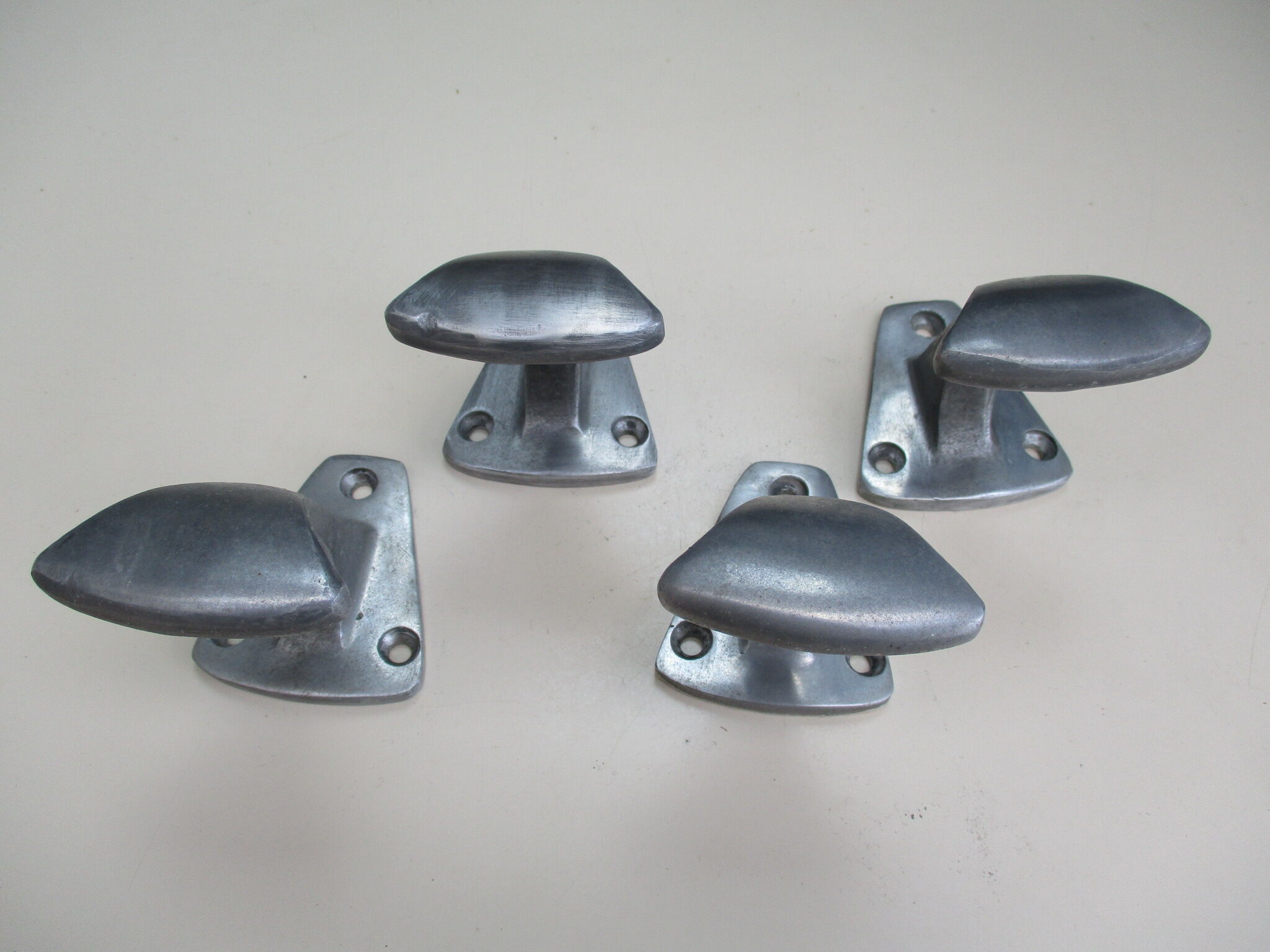 4 PATERES made of aluminum cast industrial design