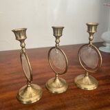 Triode of mother-of-pearl and brass candlesticks