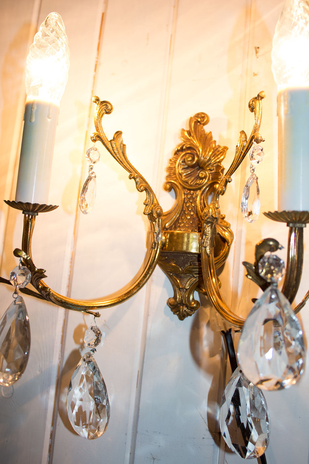 Old brass sconce with glass drops