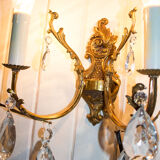 Old brass sconce with glass drops