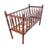 Vintage wooden child bed turned