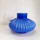 Blue opaline vase with a round handle
