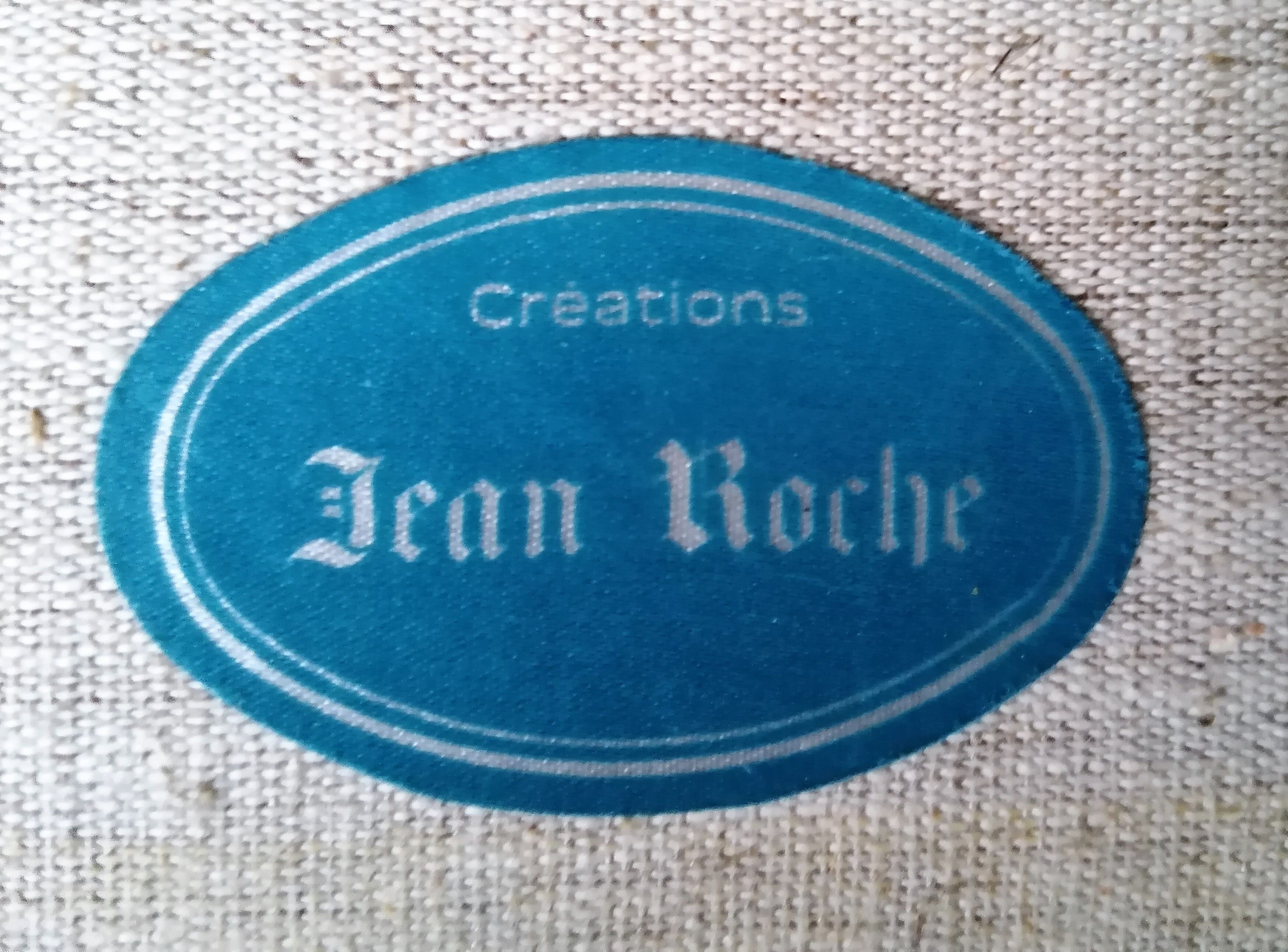 Paire de fauteuils en velours "Jean Roche "