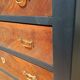 Vintage commode revamped in matte black & wood with warm tones.