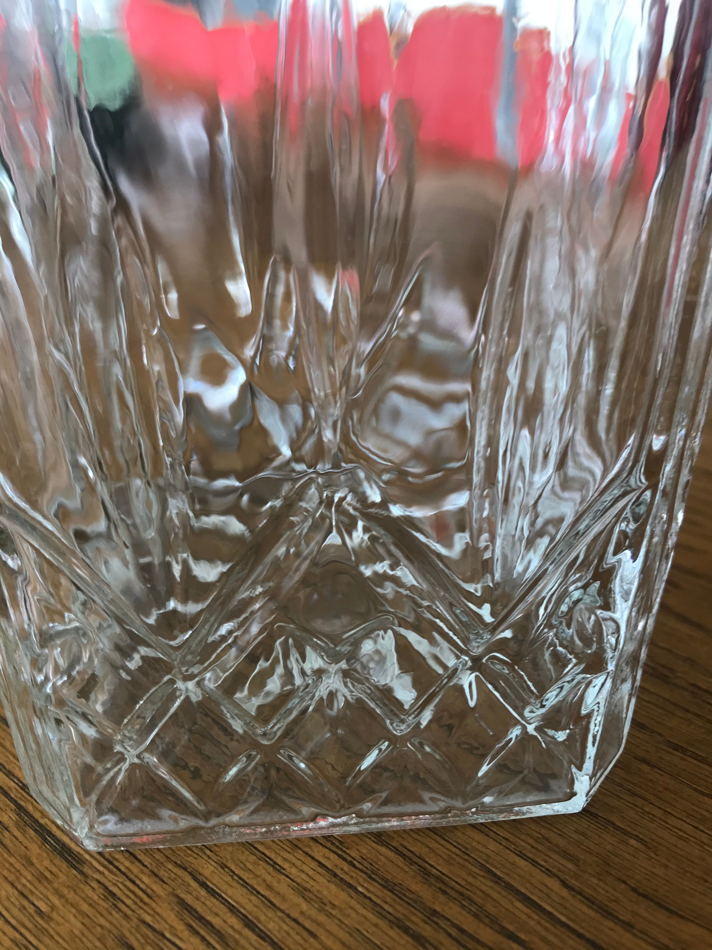 Mismatched decanter and whiskey glasses