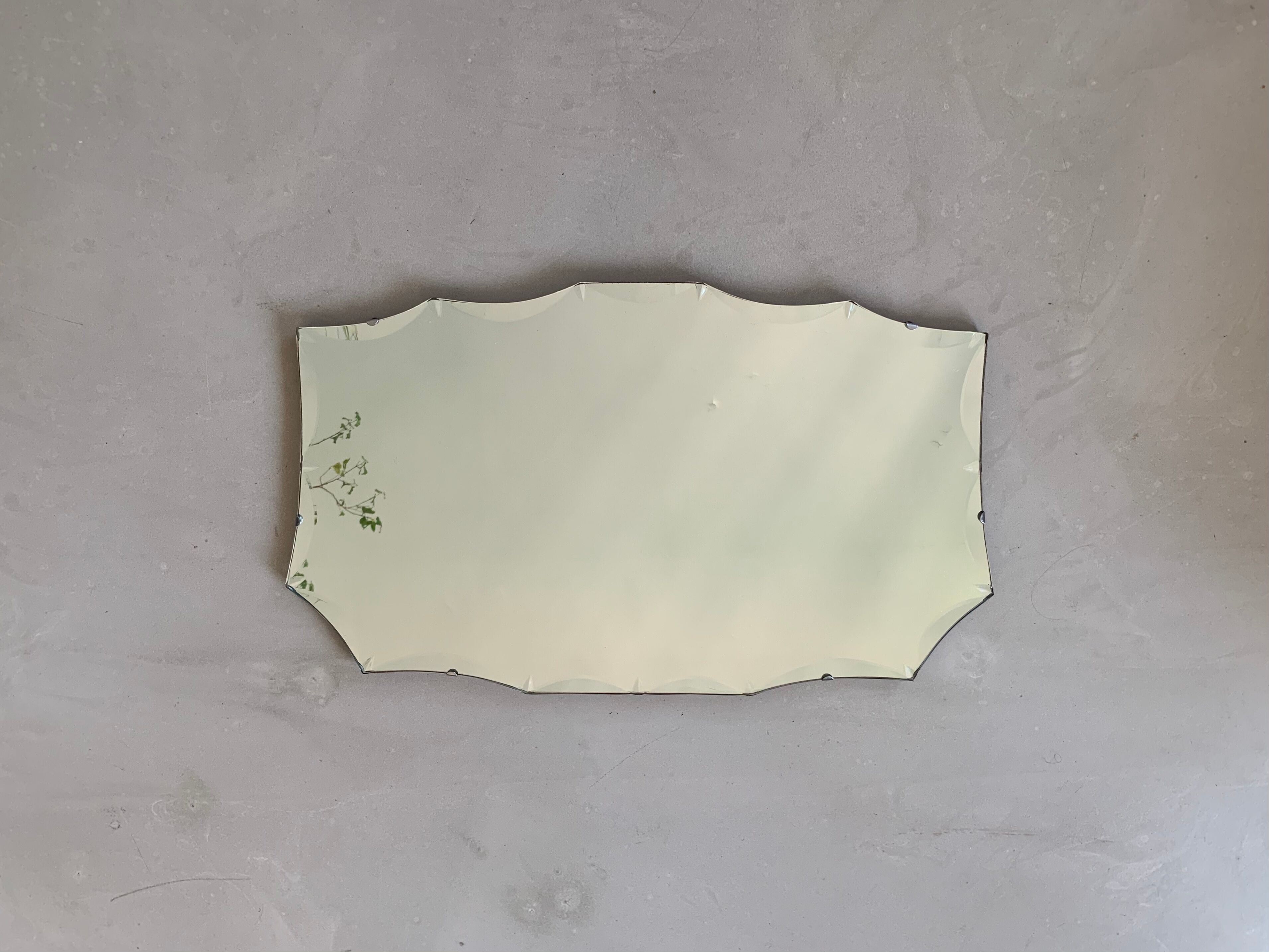 Bevelled wall mirror 60x36cm