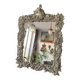 Antique Italian mirror in repoussé silver metal