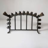 Old cast iron and brass log holder