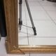 Carved wooden pediment mirror