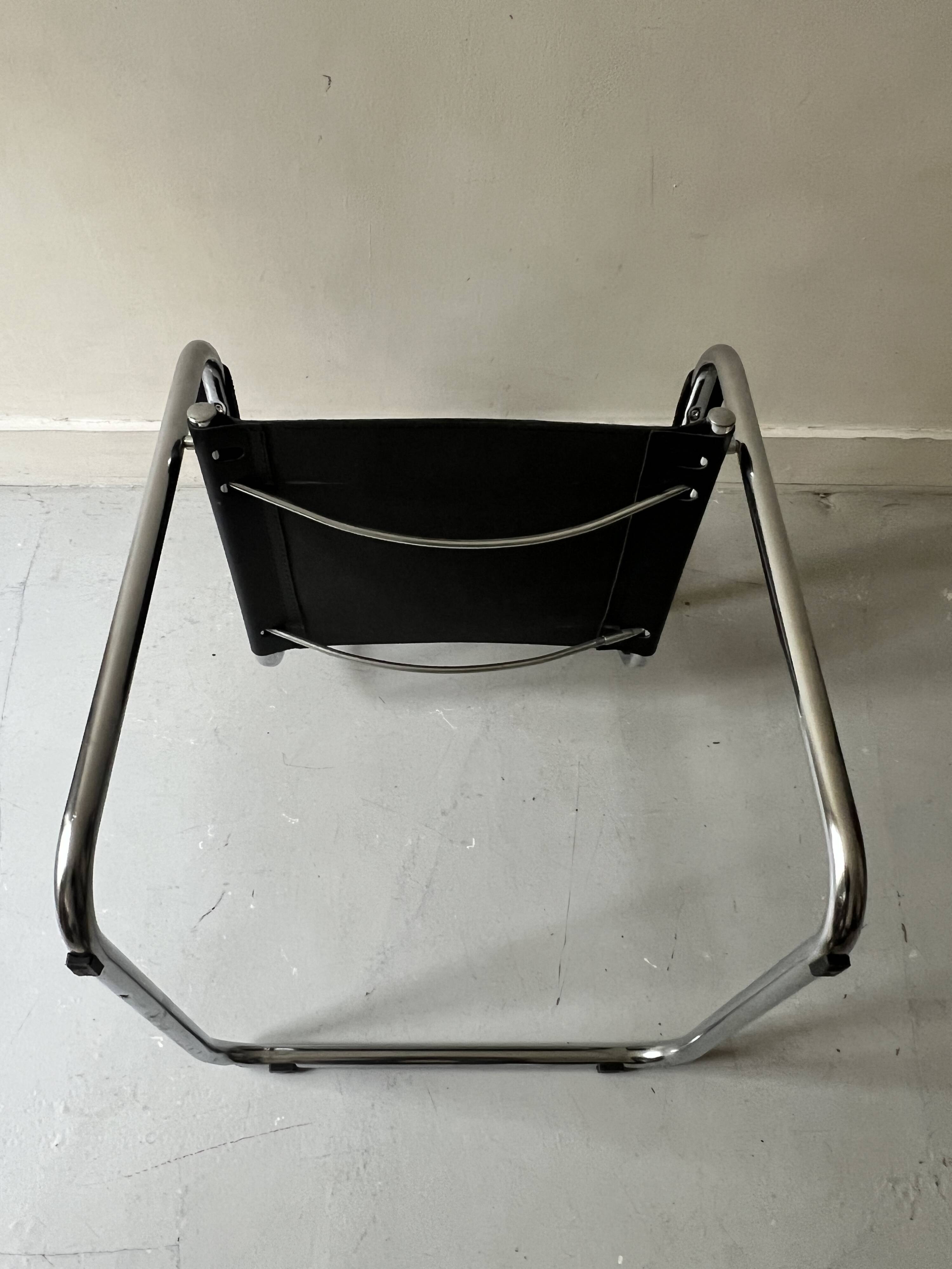 Chrome and black leather armchair