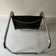 Chrome and black leather armchair