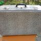 Antique black and white fibroc suitcase