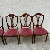 Set of 6 wooden chairs sitting red