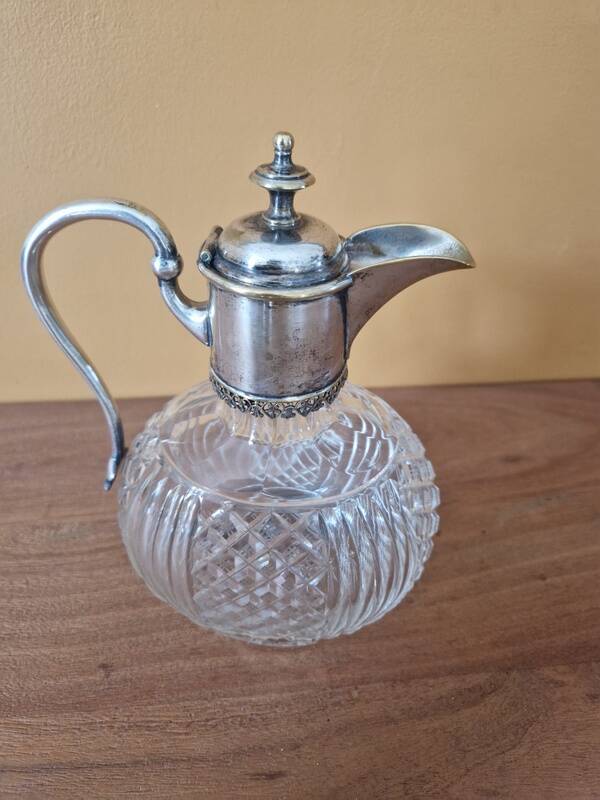 Cut crystal carafe and silver-plated metal