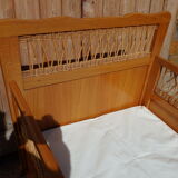 Vintage baby bed in rattan