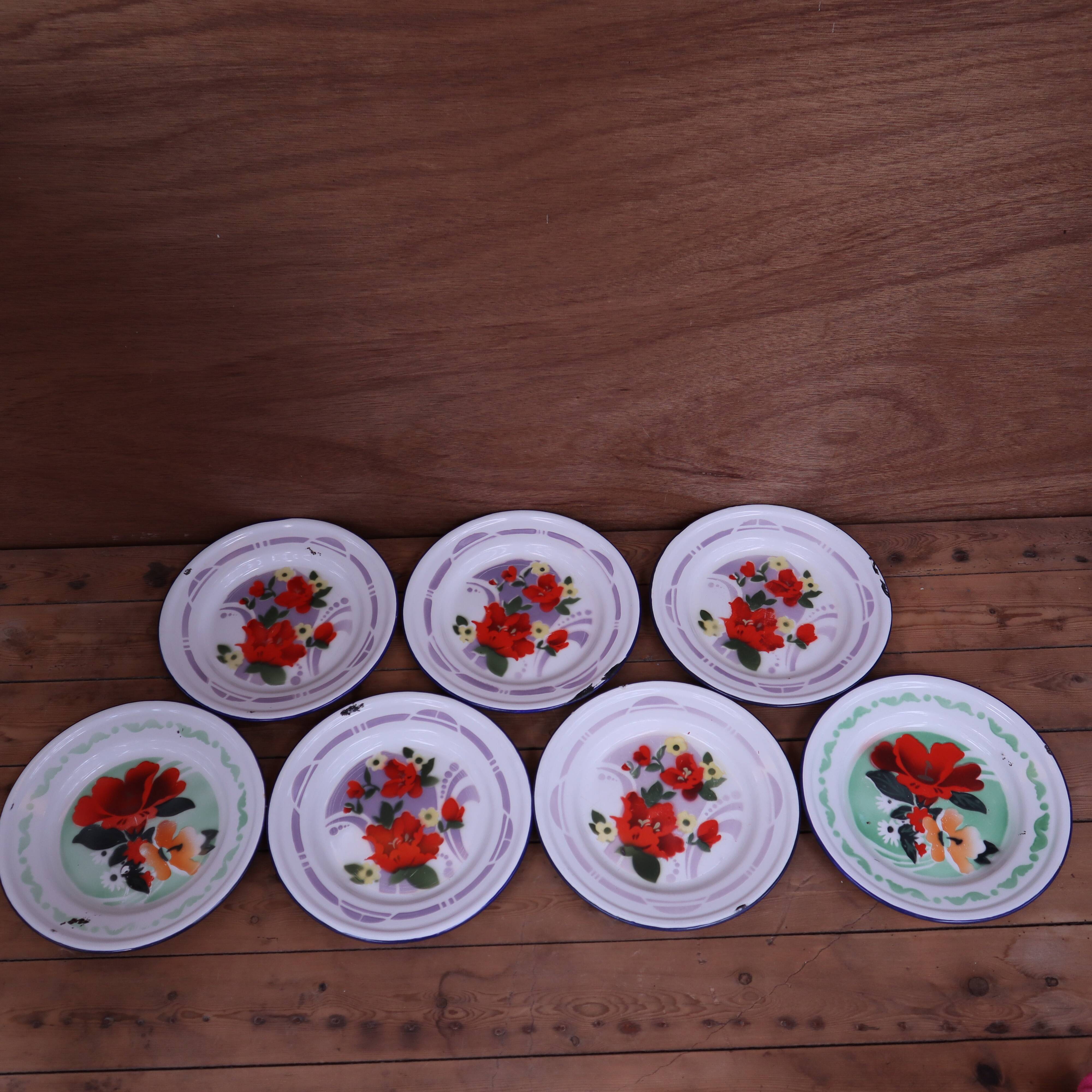 7 printed floral enamel plates "bon voyage" Made in China