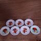 7 printed floral enamel plates "bon voyage" Made in China