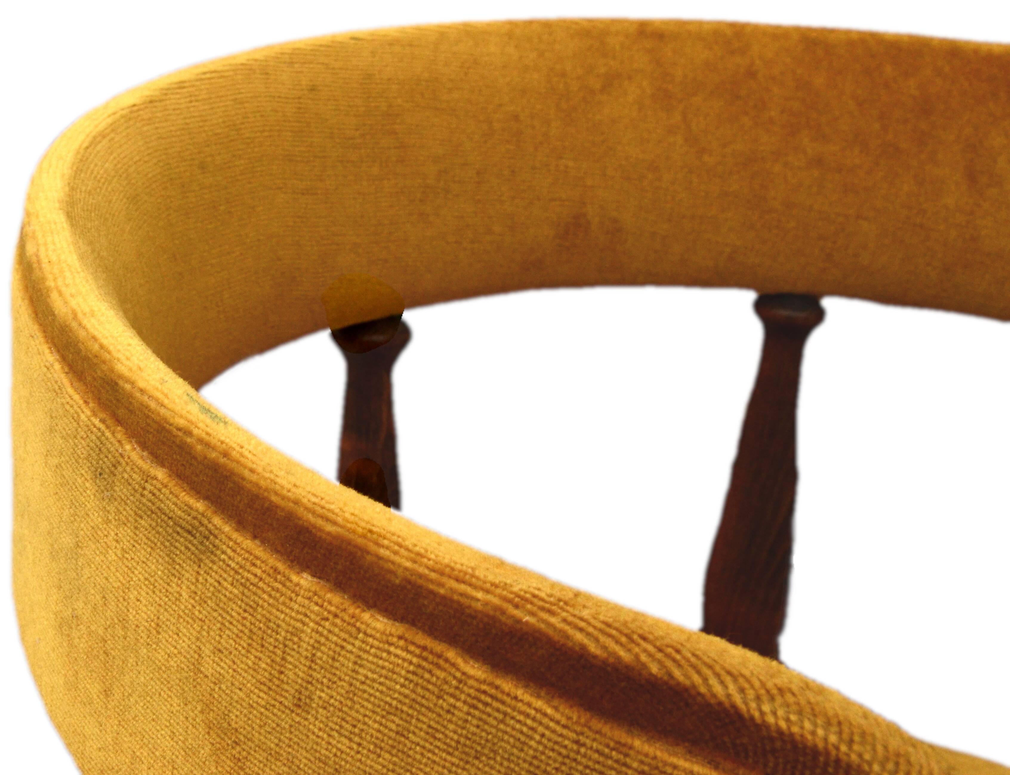 Mustard gondola armchair in the style of Helmut.