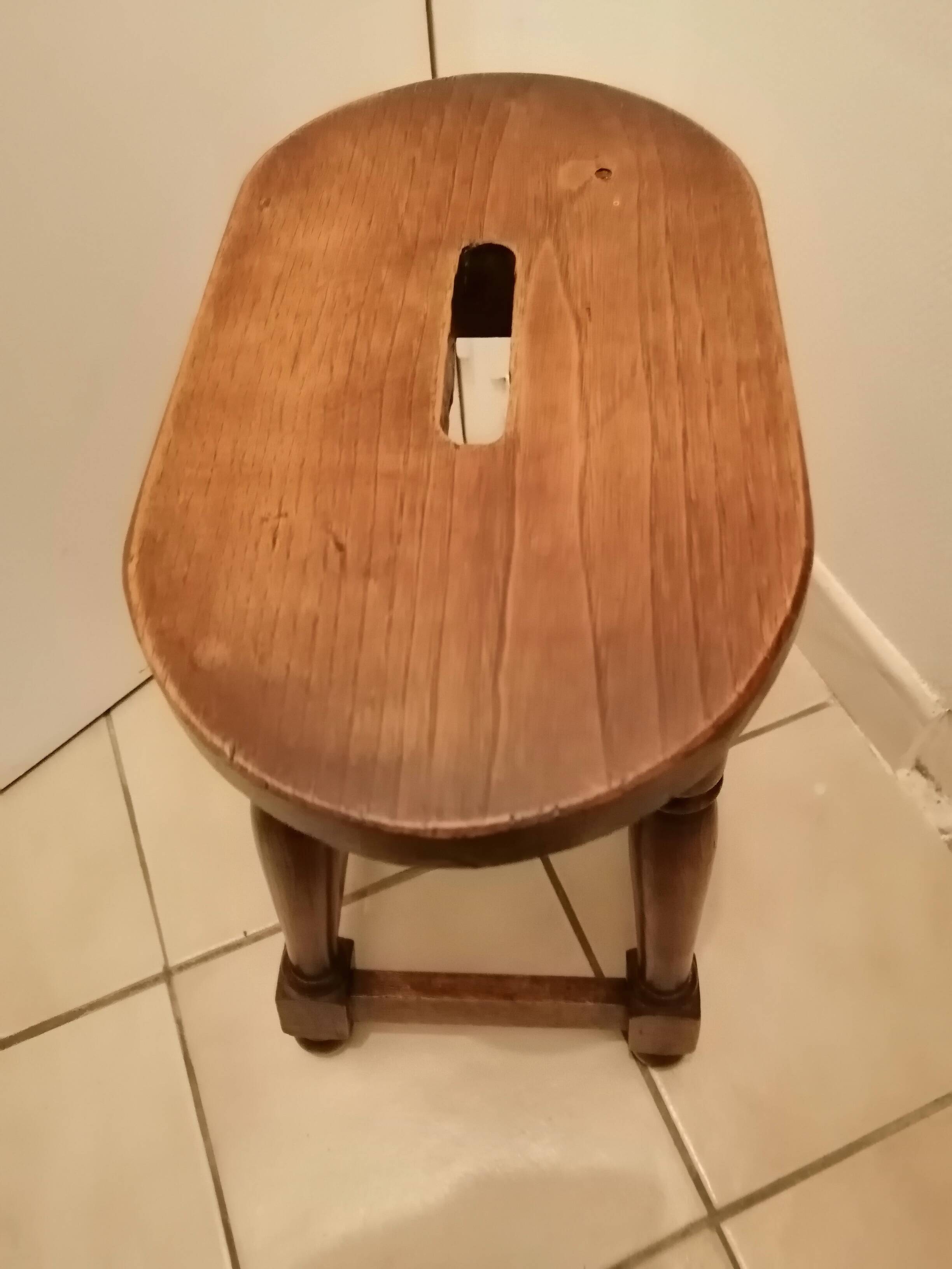 Antique rustic wooden stool