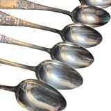 Set of twelve silver plated soup spoons