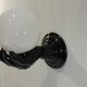 Pair of vintage 1970s wall sconces – Black hands holding an opaque globe