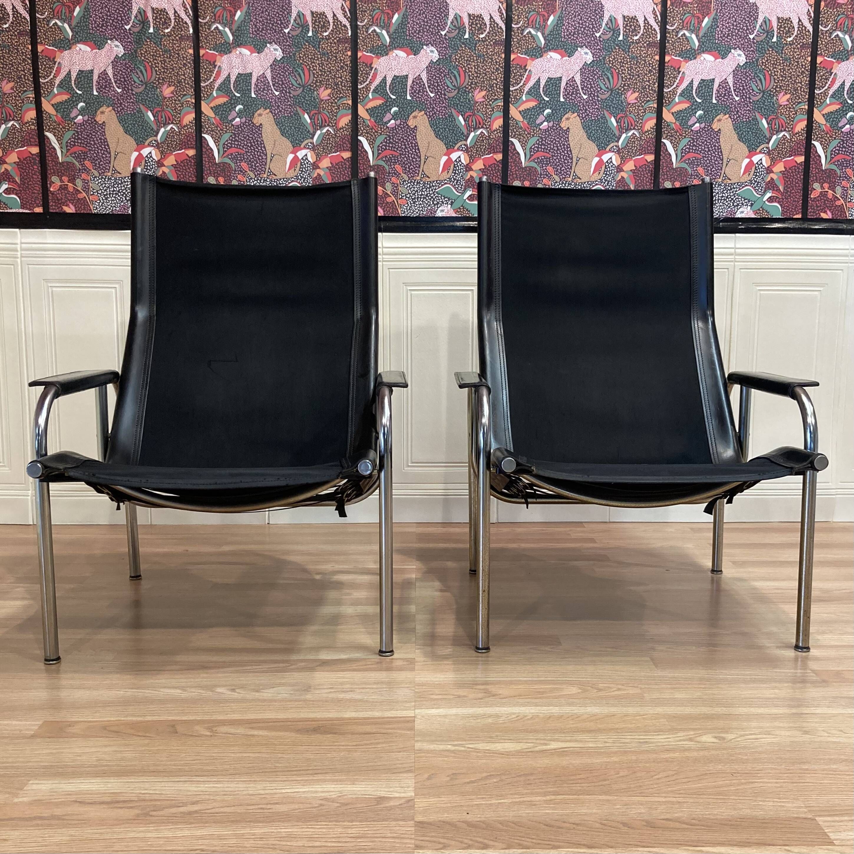 PAIRE DE FAUTEUILS CUIR NOIR ET CHROME HANS EICHENBERGER 1960.
