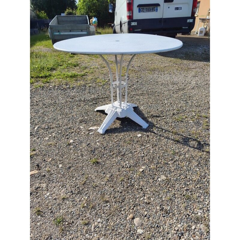 Garden table with a cast iron top.