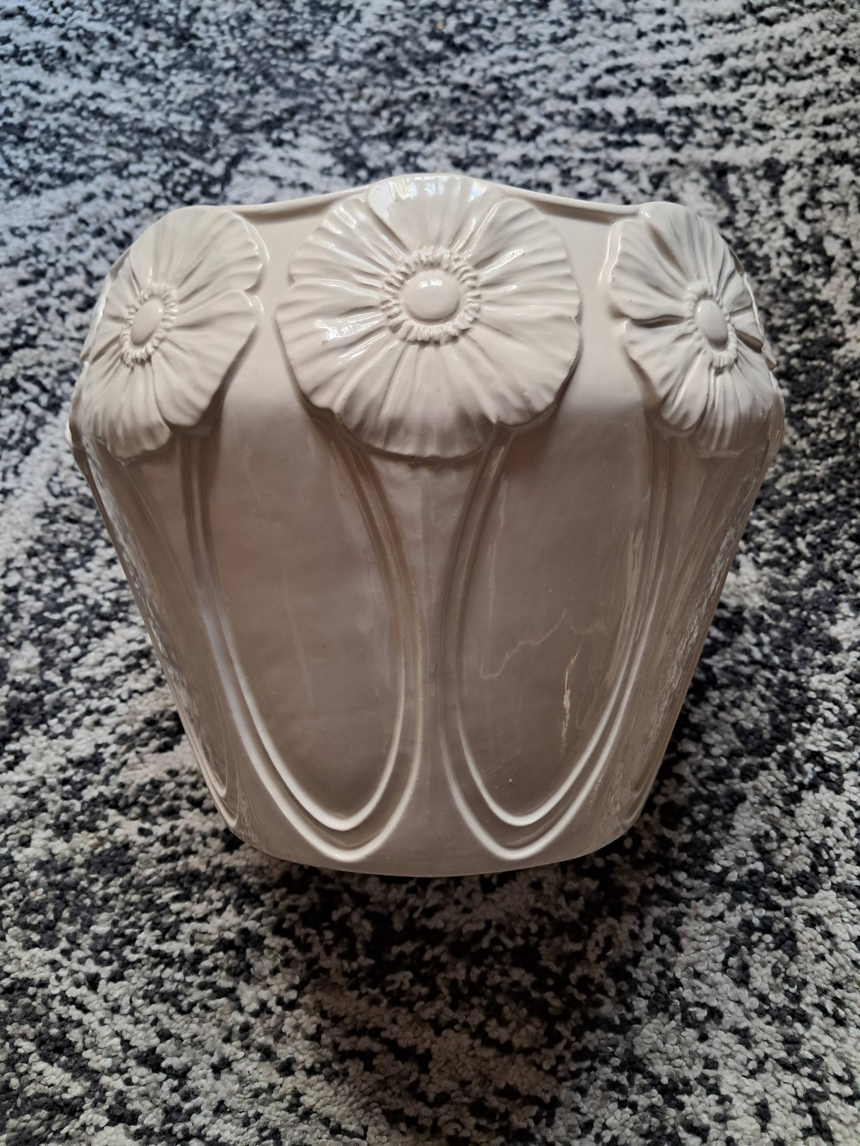 Vintage Art Nouveau ceramic with floral decoration.