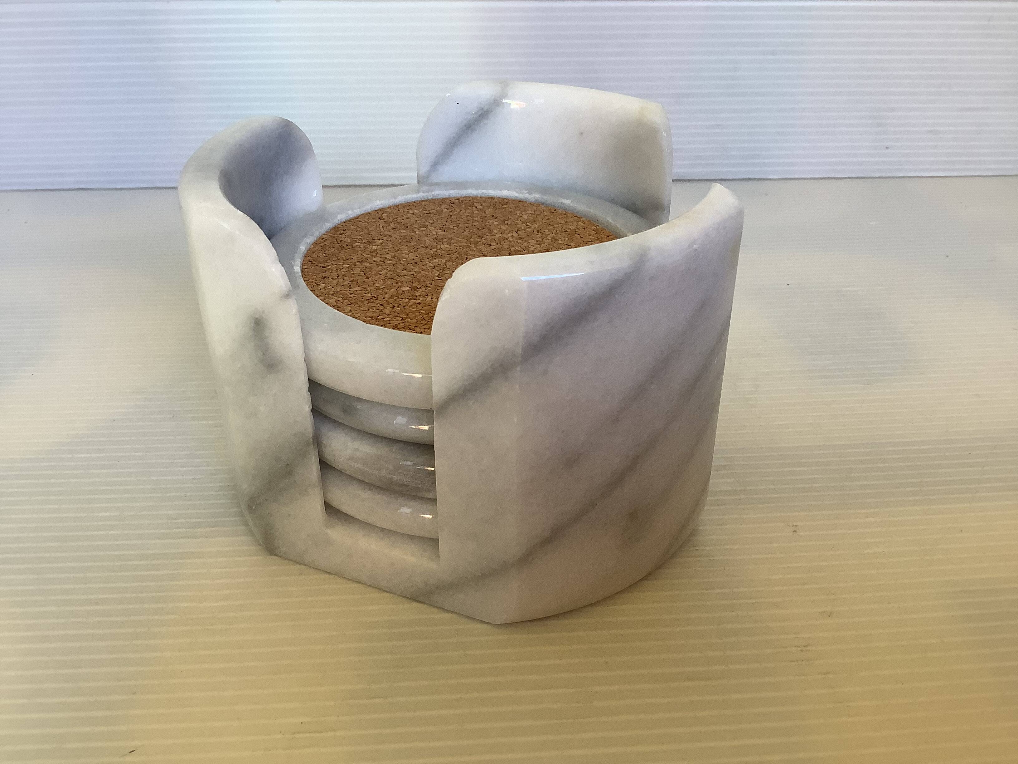 Four marble coasters with holder
