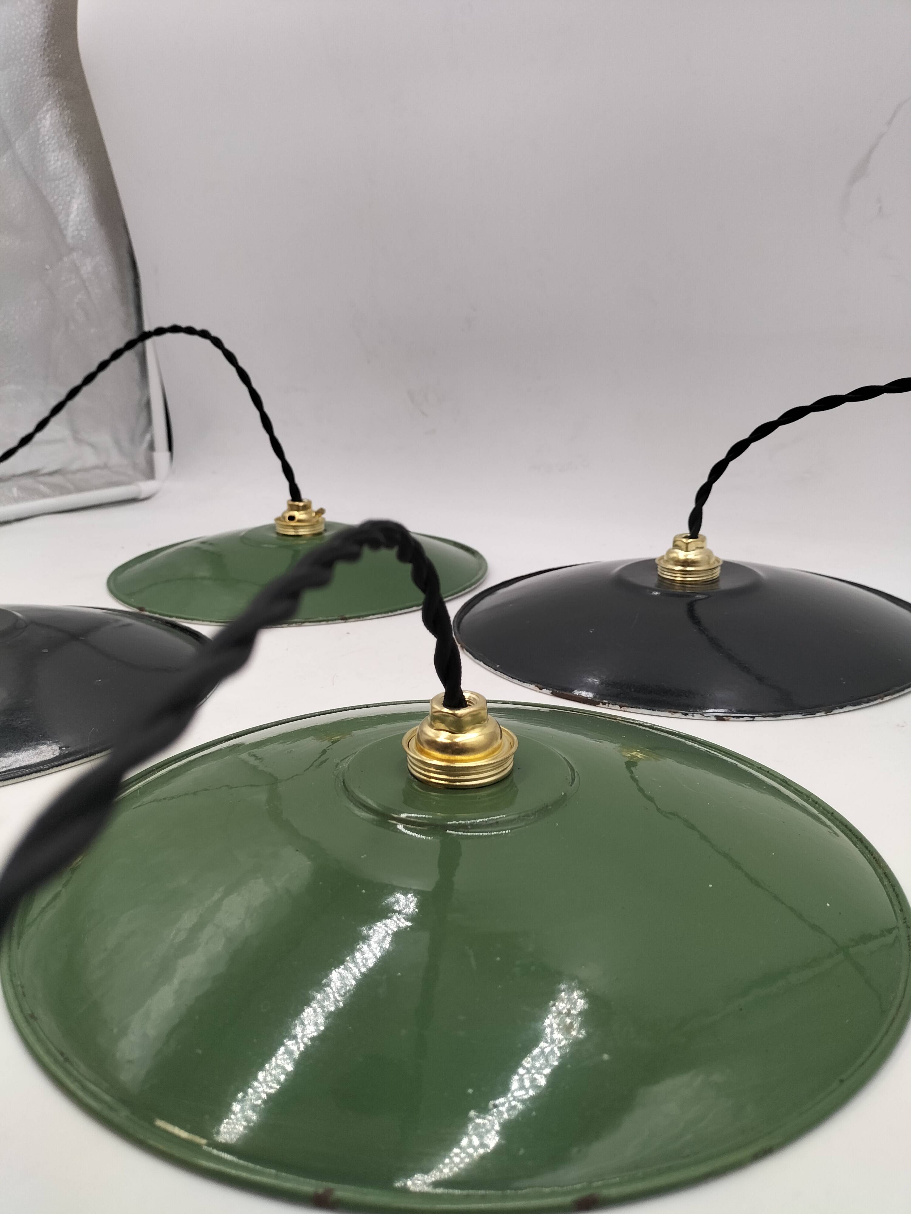4 enameled sheet metal pendants