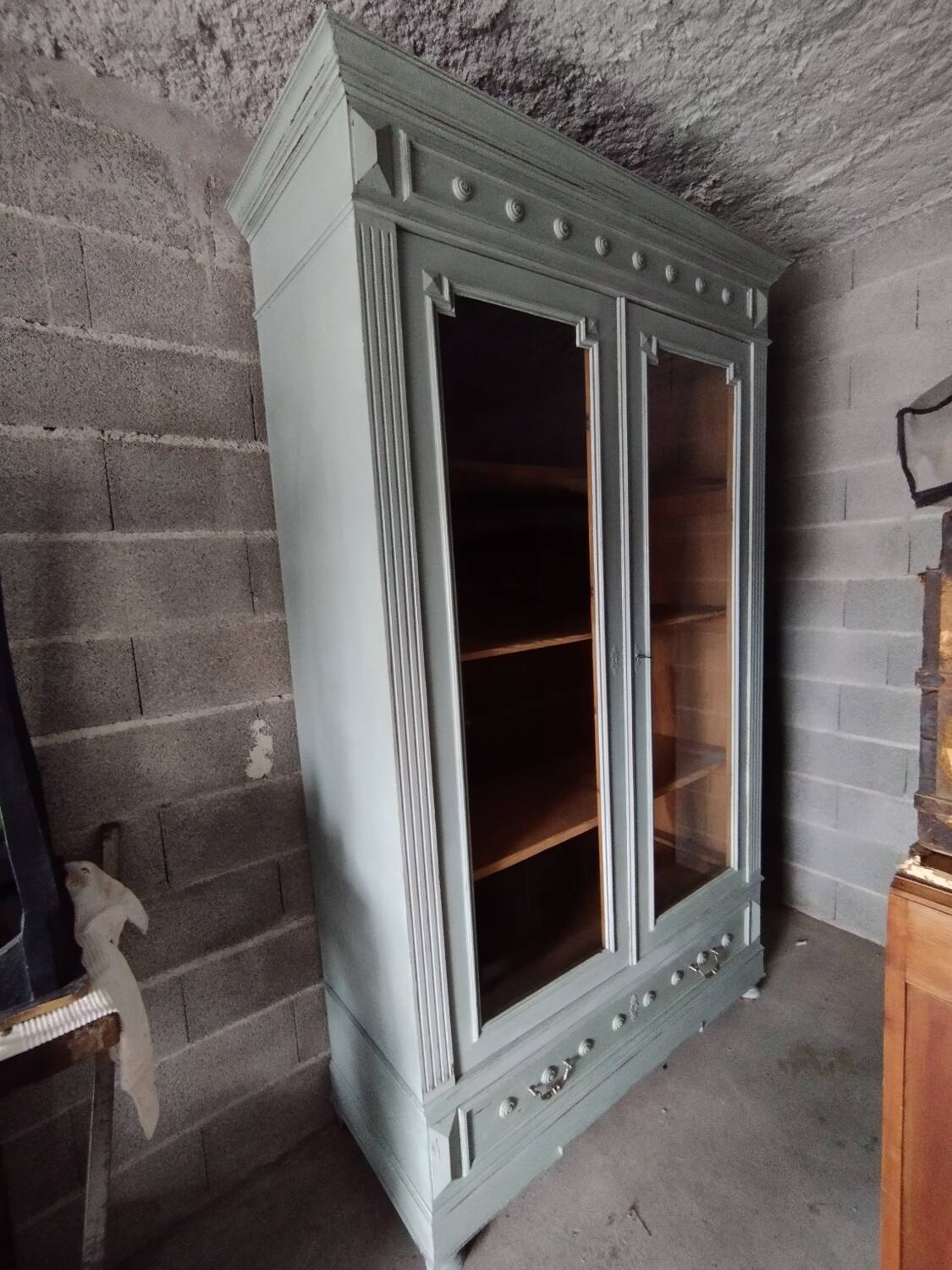 Old 2-door bookcase with chalk paint blue patina