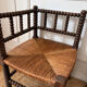 Pair of rush-seated chairs by the fireside "bobbin"