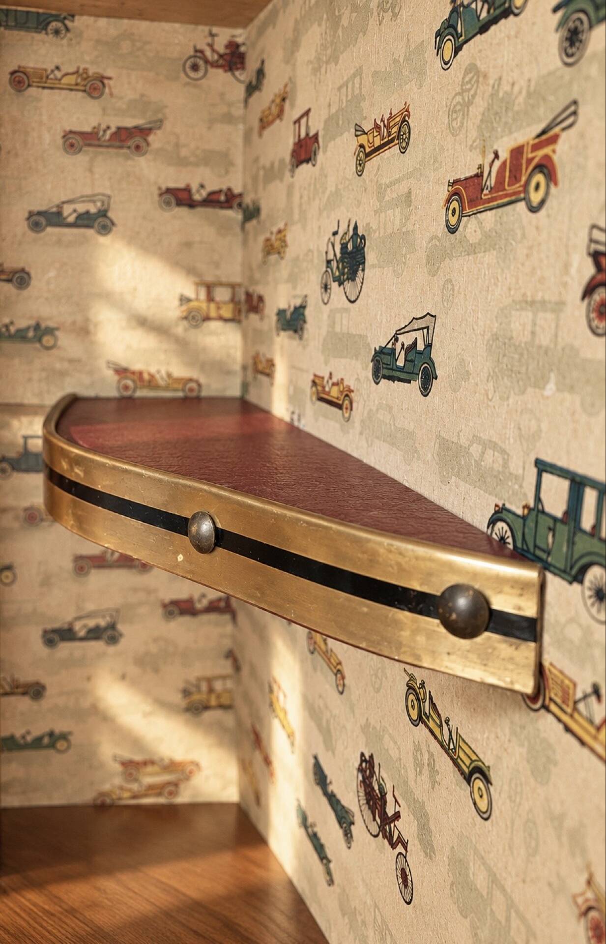 Vintage bar on wheels with tambour doors and painted decor – 1950s.