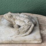 Cement frog, signed A. Picot
