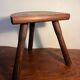 Tabouret tripode en bois