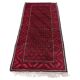 Vintage handmade Baluch rug with geometric pattern from the 1950s.