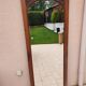 Beveled mirror on door
