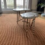 Set of two designer coffee tables in cast aluminum