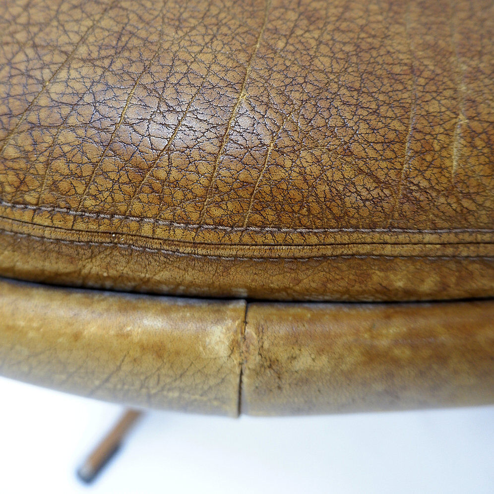 Brown leather swivel footrest with metal base - De Sede, Switzerland.