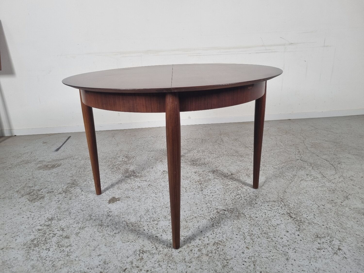 Lubke round rosewood dining table, 60s