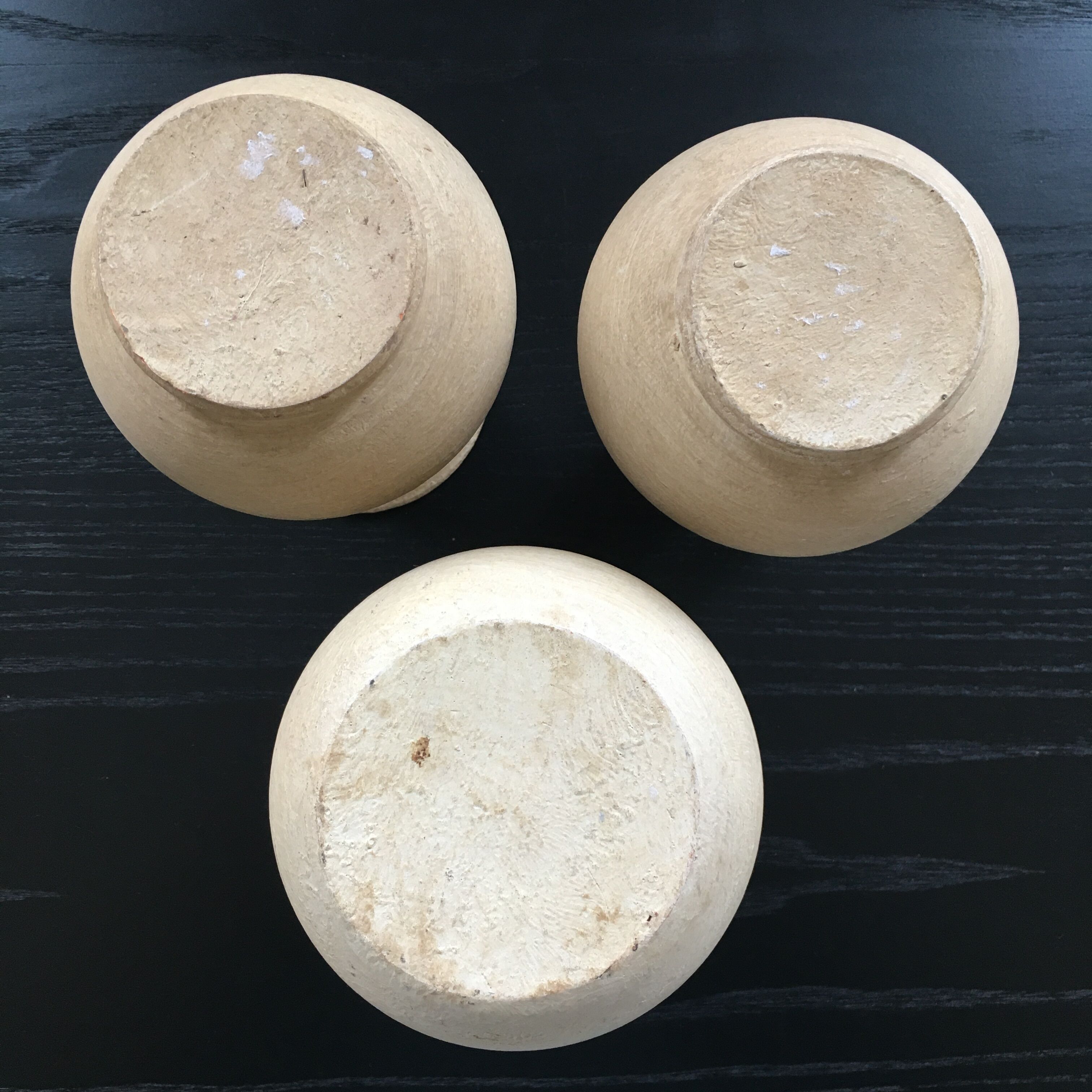 Trio of terracotta vases