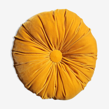 Yellow round velvet cushion