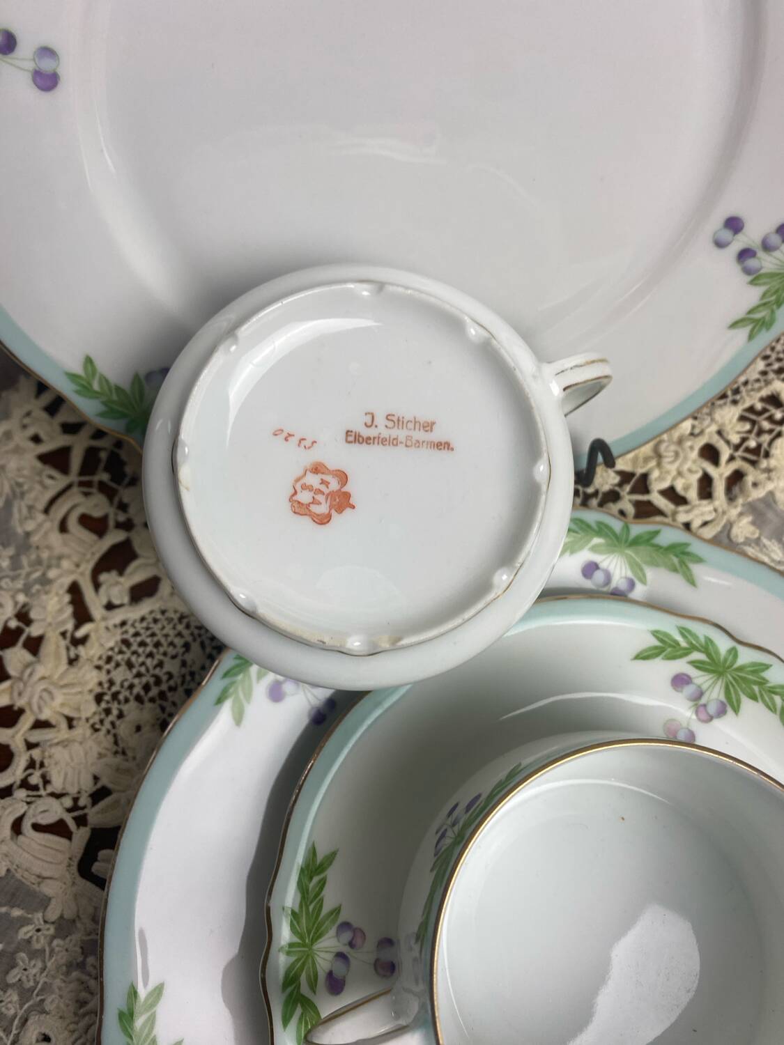 Set of 2 antique porcelain chocolate services.